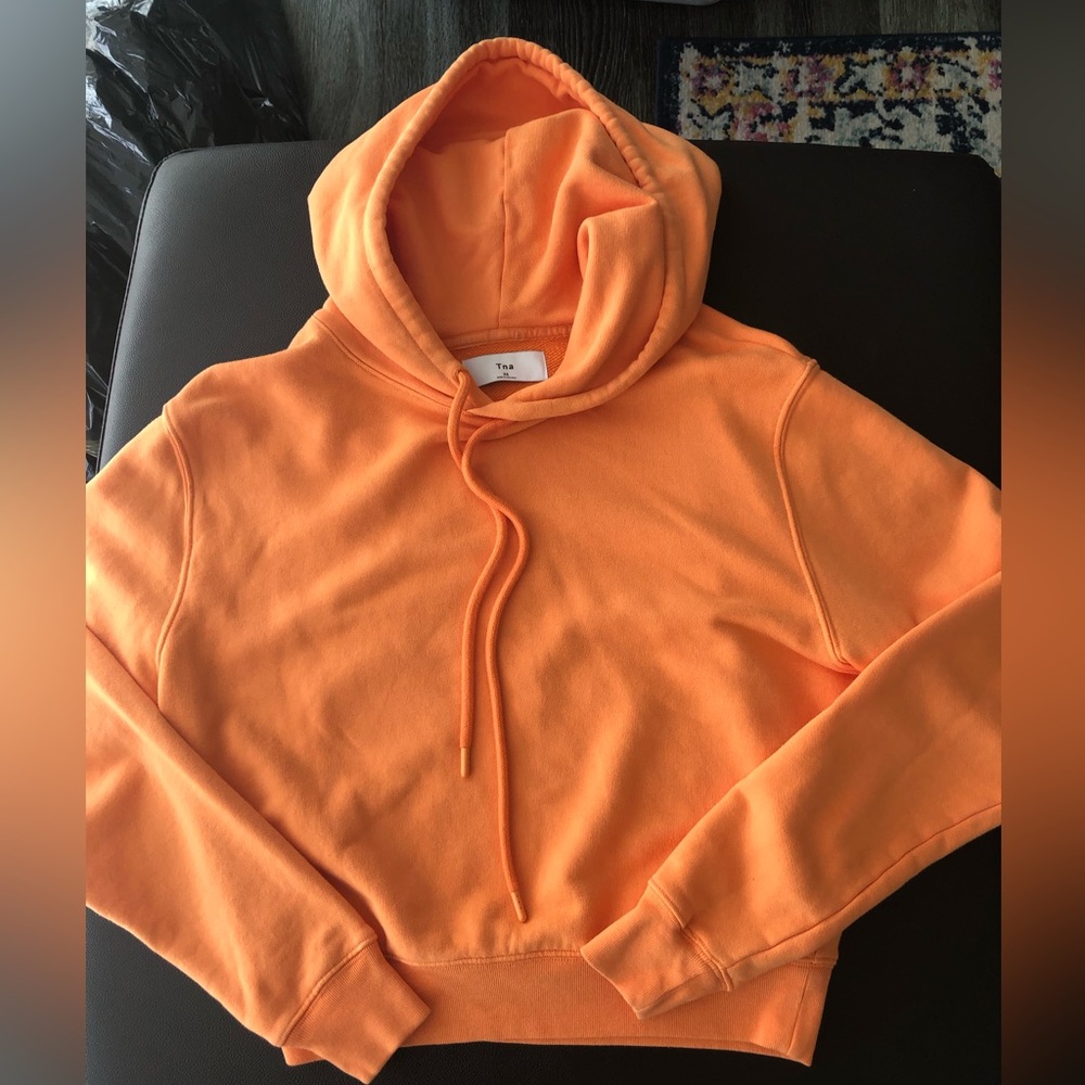 Aritzia TNA cropped orange hoodie